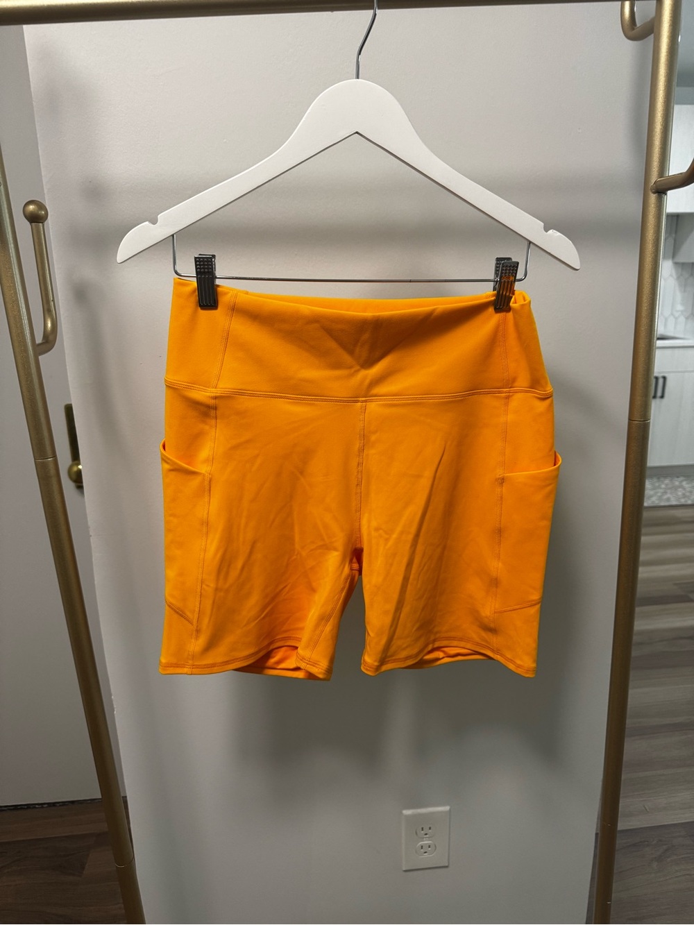 Fabletics Orange High-Rise Pocket Bike Shorts